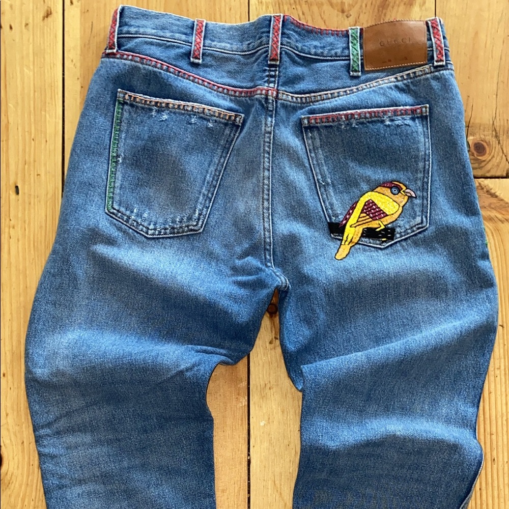 GUCCI: Slim Bird Embroidered Distressed Denim Jeans